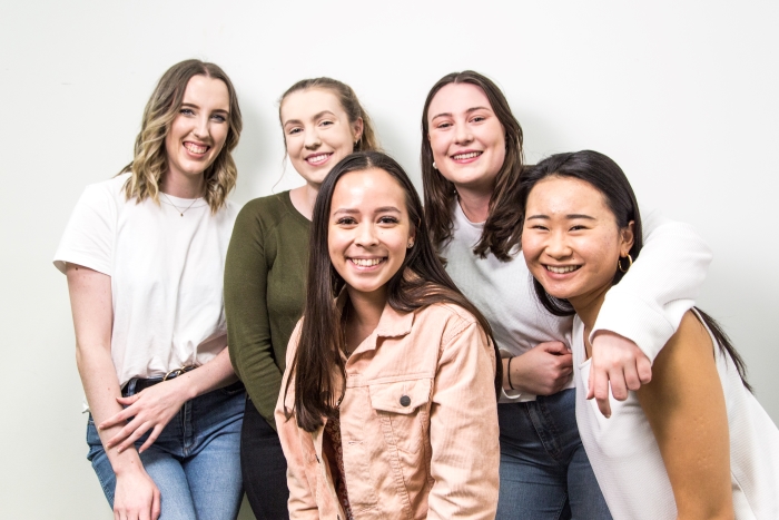 Five women smiling